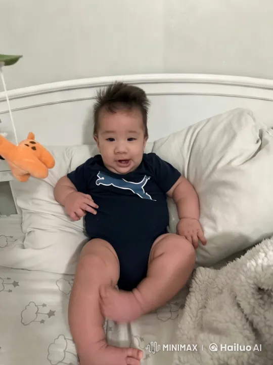 Baby Dancing and Punching Air on Bed – AI Generated Video | Hailuo AI