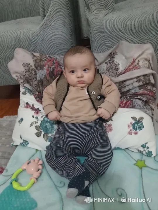 Baby Dancing Playfully on Textured Cushions – AI Generated Video | Hailuo AI