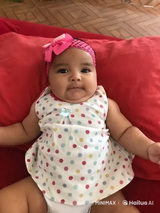 Baby's Joyful Dance Performance on Red Pillow – AI Generated Video | Hailuo AI