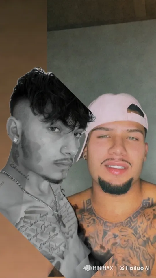 Tattooed Men Share Intimate Kiss in Artistic Video – AI Generated Video | Hailuo AI