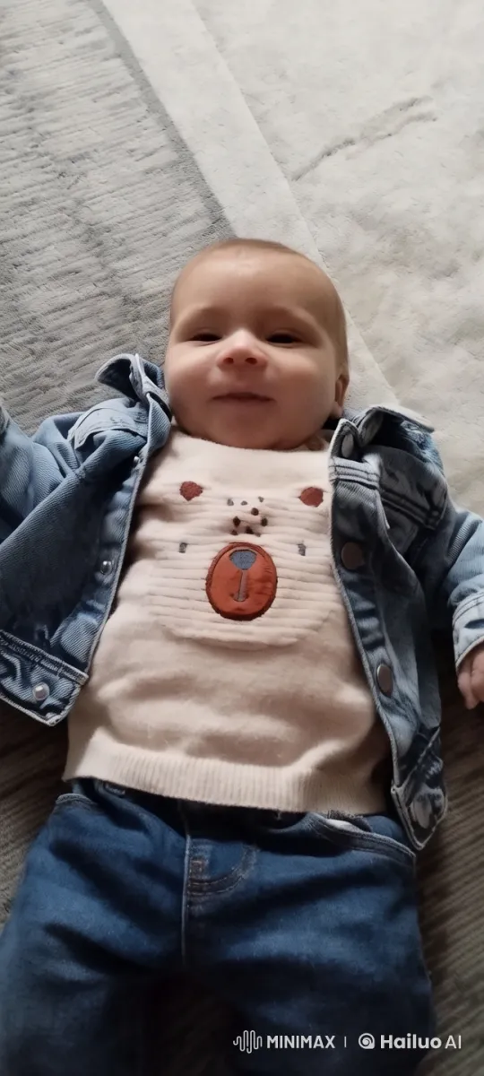 Baby Dancing in Cozy Outfit on Textured Rug – AI Generated Video | Hailuo AI