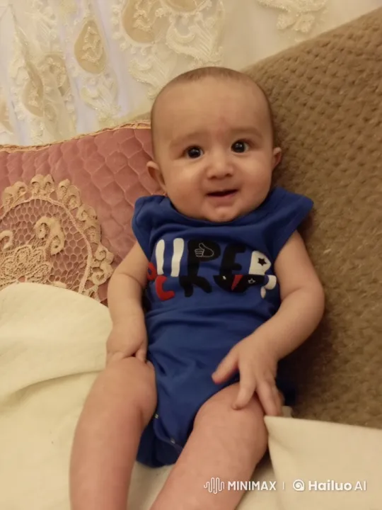 Baby Dancing Joyfully on Couch in Cozy Setting – AI Generated Video | Hailuo AI