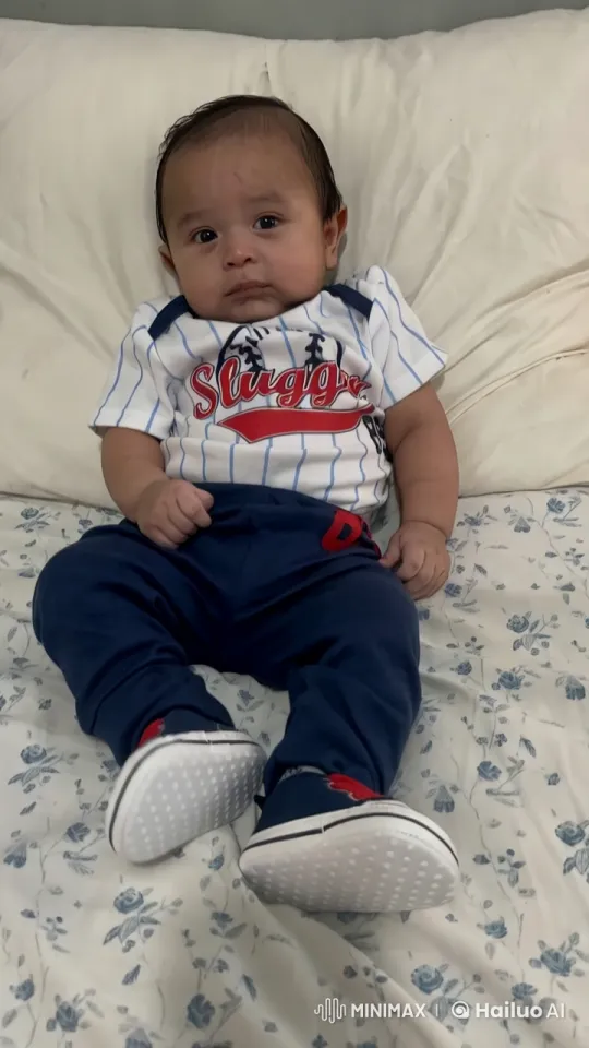 Baby "Slugger" Dancing Delightfully on Floral Bed – AI Generated Video | Hailuo AI