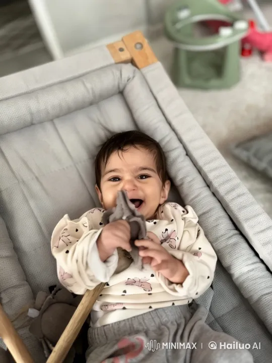 Baby Dancing in Cozy Lounger with Plush Toy – AI Generated Video | Hailuo AI