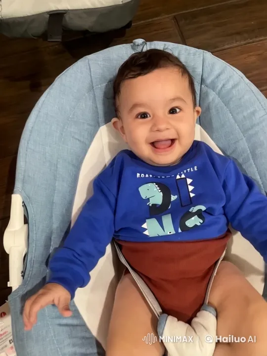 Baby in Cozy Chair: Safe, Playful, Engaging Scene – AI Generated Video | Hailuo AI