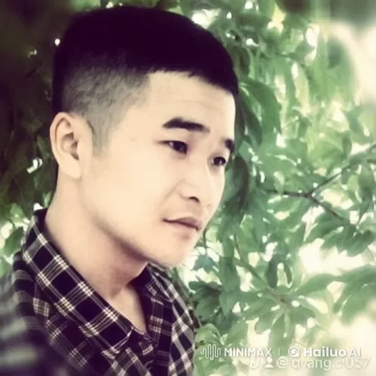 Young Man in Checkered Shirt Amidst Swaying Greenery – AI Generated Video | Hailuo AI