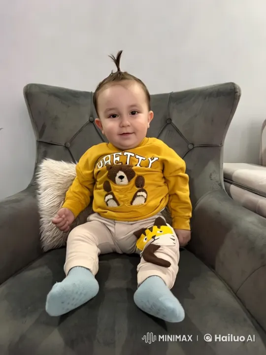 Baby Dances Playfully on Armchair – AI Generated Video | Hailuo AI