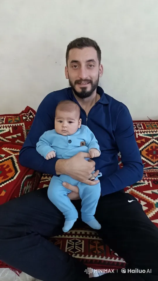 Man Gentlemanly Dances with Baby on Couch – AI Generated Video | Hailuo AI
