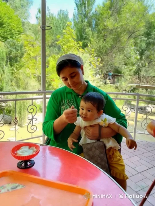 Family Enjoying Outdoor Meal by River – AI Generated Video | Hailuo AI