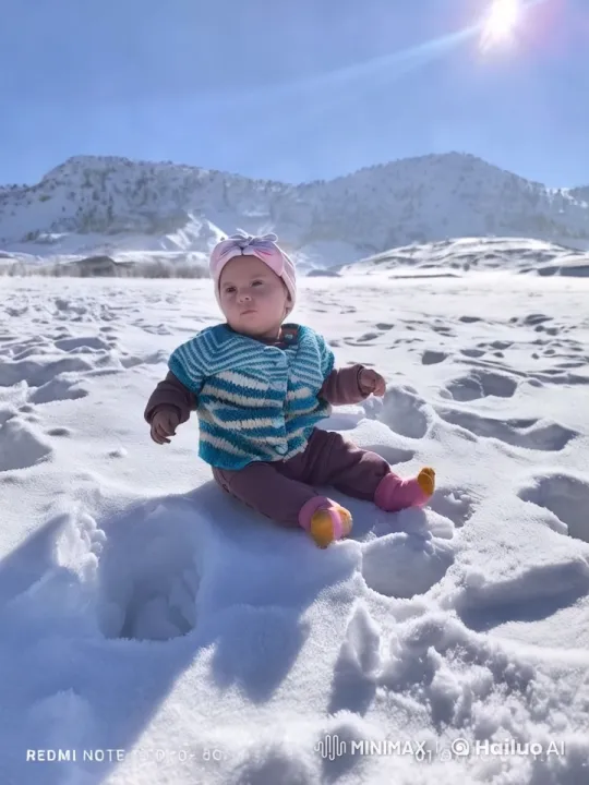 Baby in Snow: Serene Winter Landscape Captured – AI Generated Video | Hailuo AI
