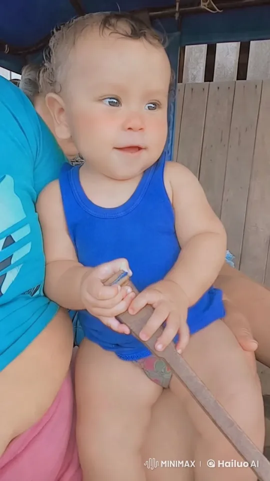 Baby with Wooden Stick in Rustic Setting – AI Generated Video | Hailuo AI