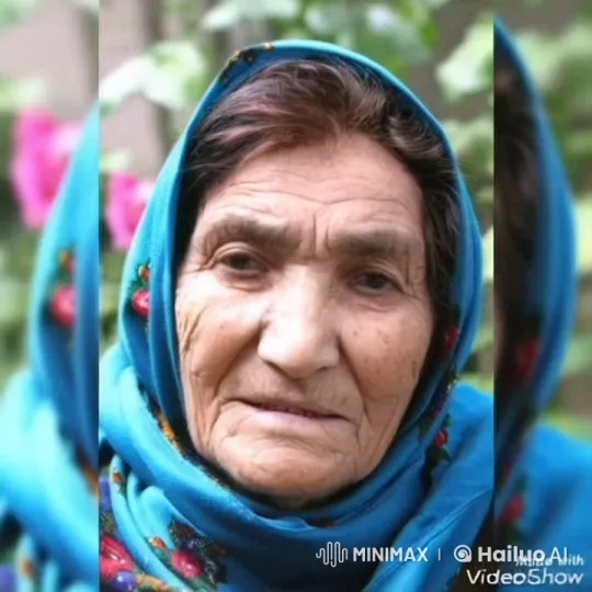 Elderly Woman Greet in Live2D with Floral Background – AI Generated Video | Hailuo AI