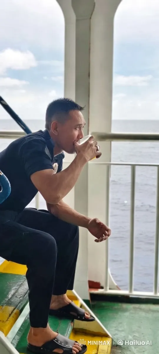 Man Enjoying Drink on Boat with Serene Ocean View – AI Generated Video | Hailuo AI