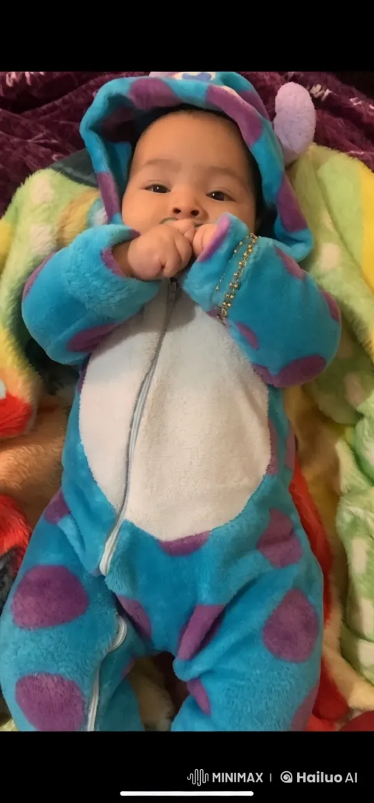 Baby's Playful Kung Fu Dance in Colorful Blanket Setting – AI Generated Video | Hailuo AI