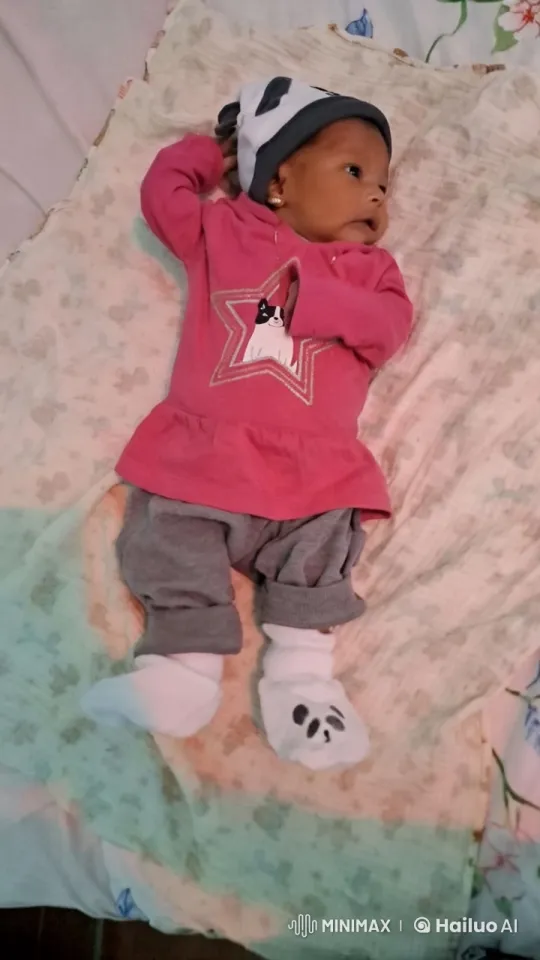 Cute Baby Showcasing Outfit on Cozy Blanket – AI Generated Video | Hailuo AI