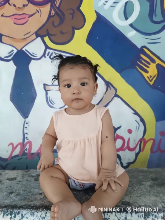 Baby's Joyful Dance on Vibrant Mural Background – AI Generated Video | Hailuo AI
