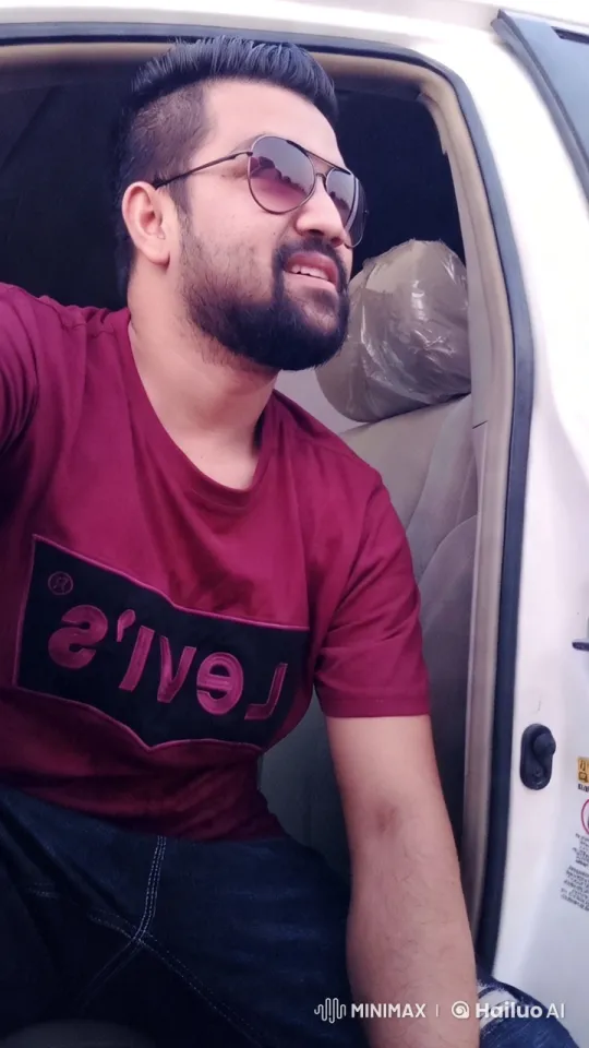 Man in Levi's Shirt in White Car with Smooth Camera Moves – AI Generated Video | Hailuo AI