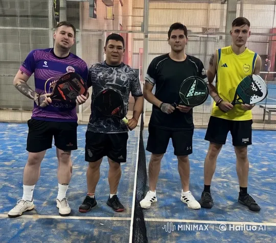 Men Bonding on a Padel Court with Group Hug – AI Generated Video | Hailuo AI