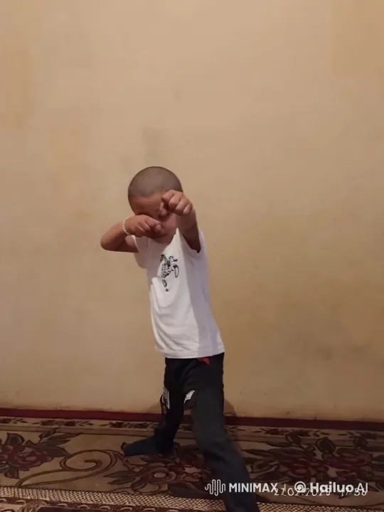 Young Boy Demonstrates Energetic Kungfu Skills – AI Generated Video | Hailuo AI