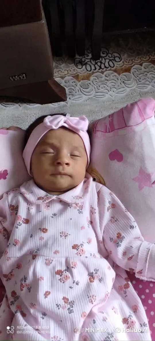 Baby in Cozy Floral Bed with Soft Lighting – AI Generated Video | Hailuo AI