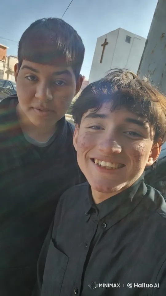 Boys Kiss in Front of Religious Building – AI Generated Video | Hailuo AI