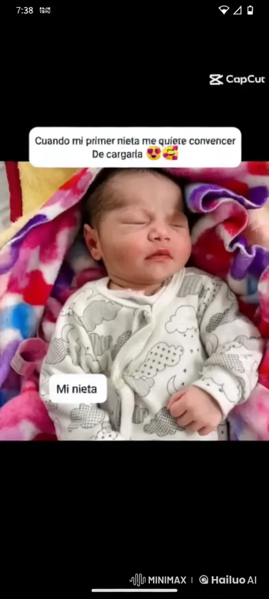 Granddaughter's Gentle Charm on Colorful Blanket – AI Generated Video | Hailuo AI