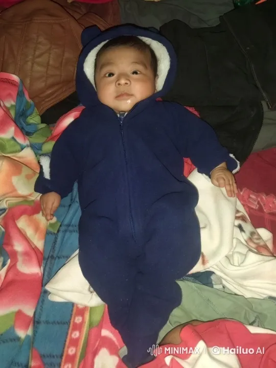 Baby's Playful Kung Fu Dance on Colorful Blanket – AI Generated Video | Hailuo AI
