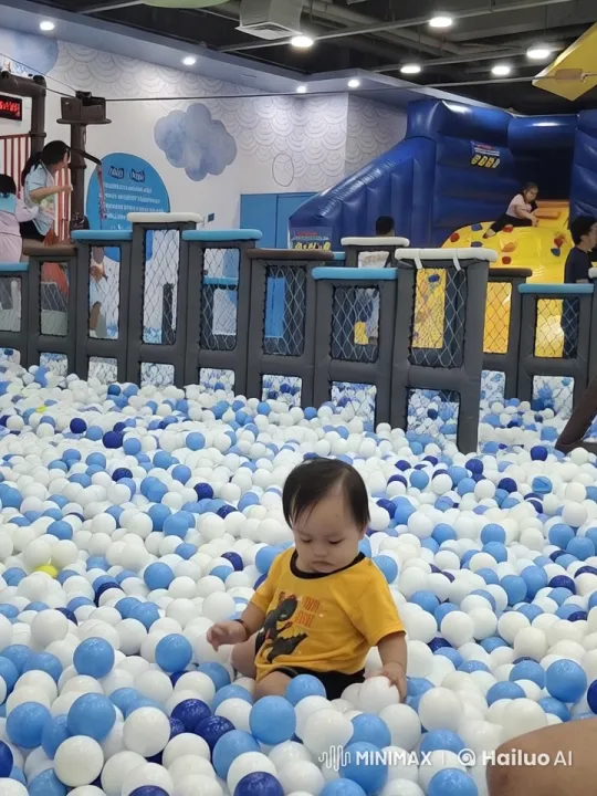Vibrant Indoor Playground with Dinosaur Shirt Child – AI Generated Video | Hailuo AI