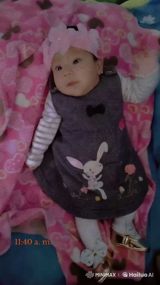 Baby in Colorful Outfit on Playful Blanket – AI Generated Video | Hailuo AI