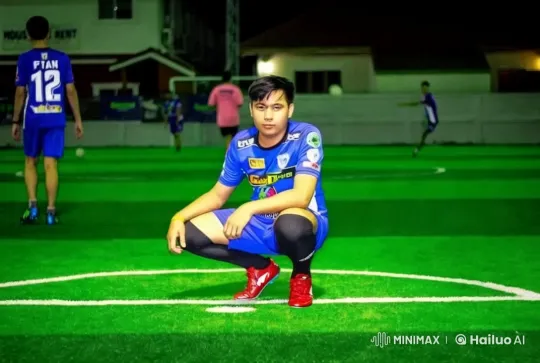 Young Footballer Prepares for Game on Bright Field – AI Generated Video | Hailuo AI