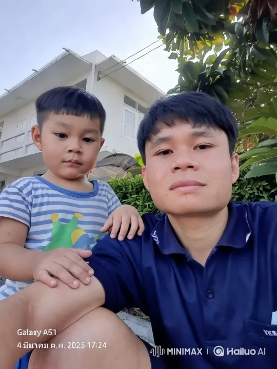 Man and Child Relaxing Outdoors with Serene Background – AI Generated Video | Hailuo AI