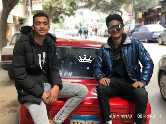 Two Young Men Playfully Karate on Car Trunk in Animated Street – AI Generated Video | Hailuo AI