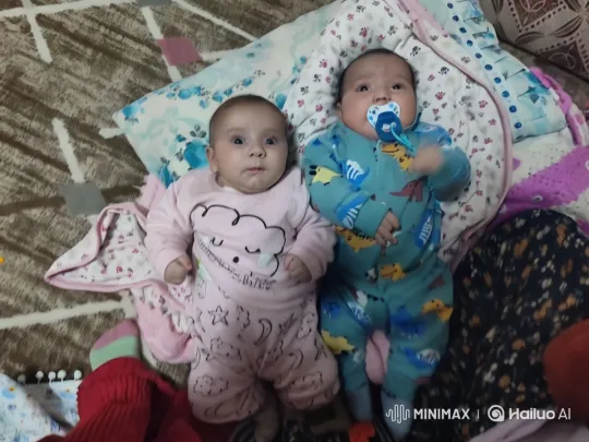 Infants Embrace and Dance in Cozy Setting – AI Generated Video | Hailuo AI