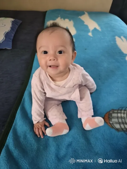 Baby Mimics Ancient Dance on Decorated Blanket – AI Generated Video | Hailuo AI