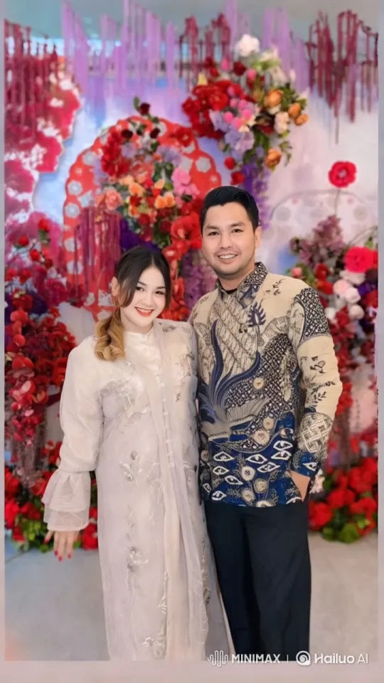 Elegant Couple Performs Dynamic Kungfu in Floral Setting – AI Generated Video | Hailuo AI
