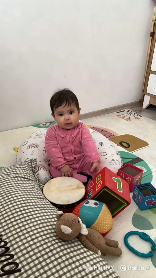Baby's Joyful Playtime Dance on Colorful Mat – AI Generated Video | Hailuo AI