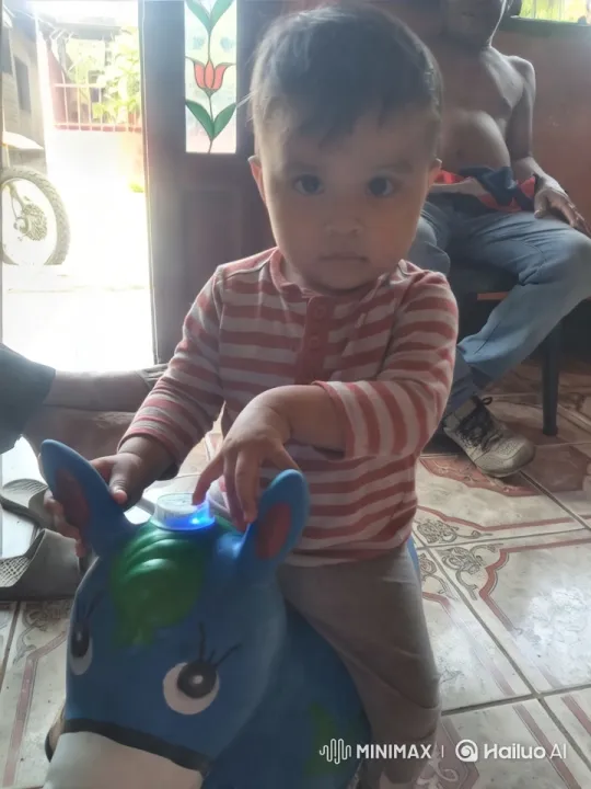 Child and Illuminated Toy Horse Interaction – AI Generated Video | Hailuo AI