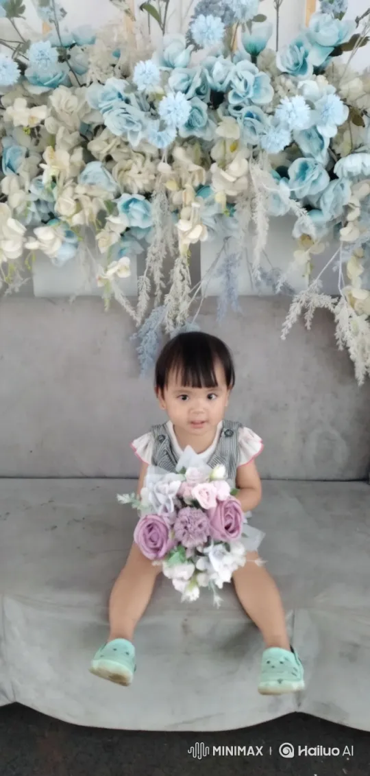 Child with Flowers in Elegant Setting – AI Generated Video | Hailuo AI