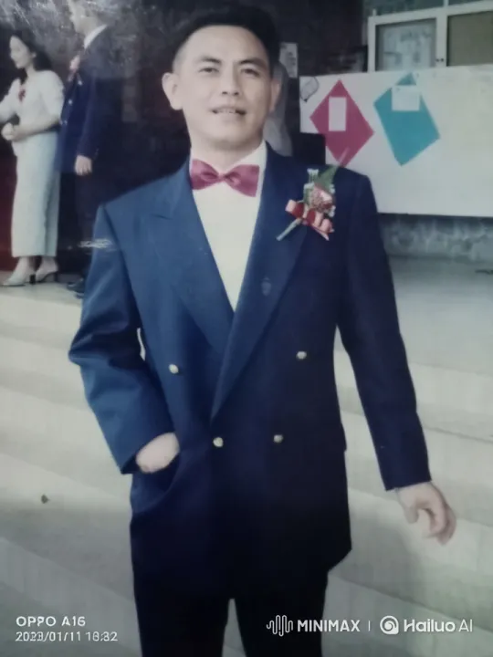 Man in Formal Suit with Laughing Posture at Celebration – AI Generated Video | Hailuo AI