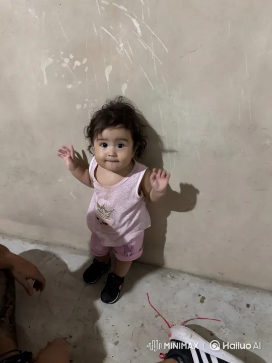 Child Dancing in Pink Outfit with Minimalist Setting – AI Generated Video | Hailuo AI