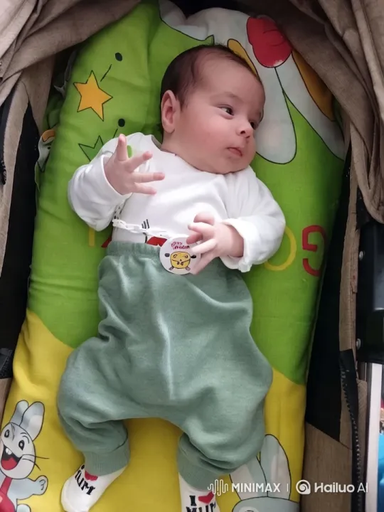 Baby Dancing in Stroller with Colorful Surroundings – AI Generated Video | Hailuo AI
