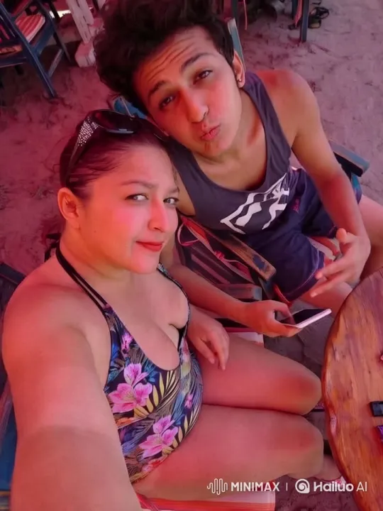 Couple Embraces and Dances on Vibrant Beach – AI Generated Video | Hailuo AI