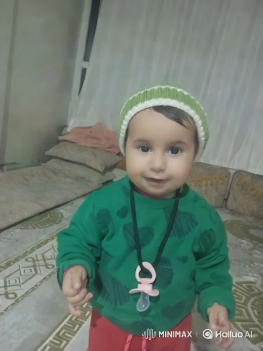 Cozy Room: Child in Heart Sweater with Pacifier – AI Generated Video | Hailuo AI