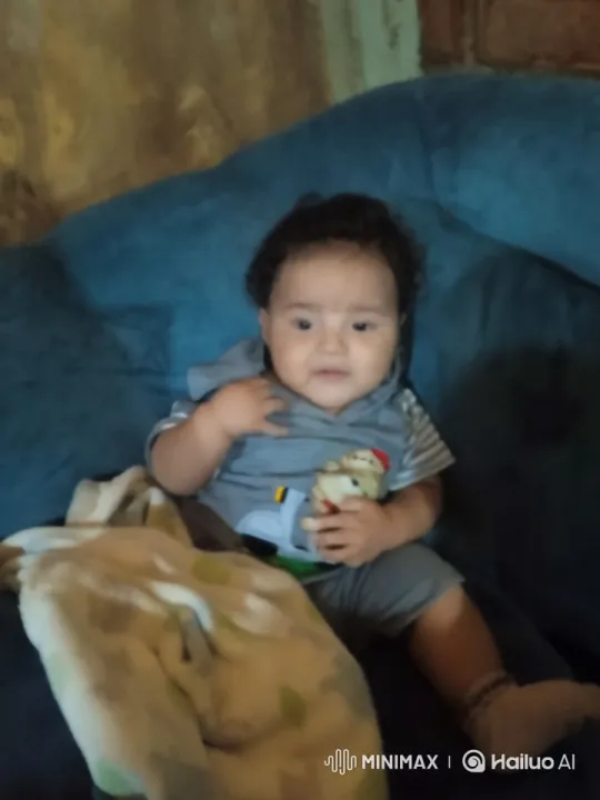 Baby Dancing Joyfully in Cozy Setting with Warm Lighting – AI Generated Video | Hailuo AI