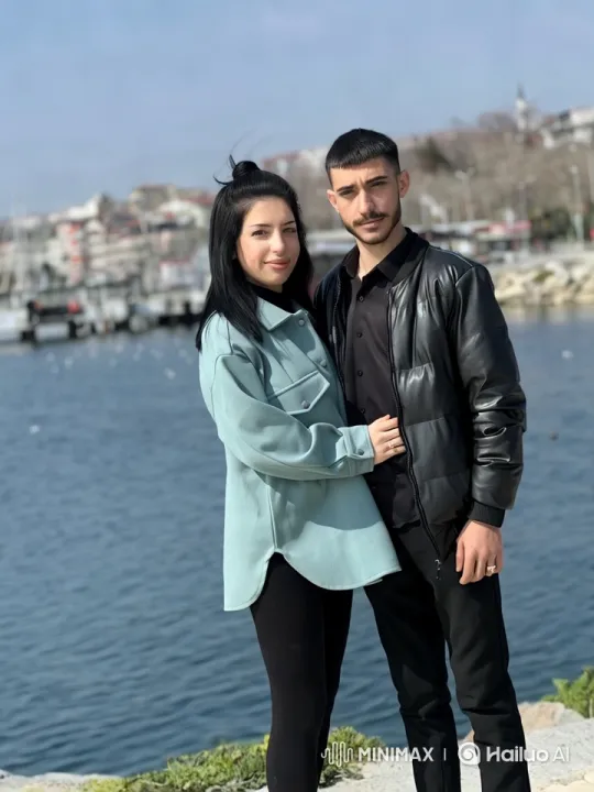 Couple Embracing by Serene Waterfront – AI Generated Video | Hailuo AI