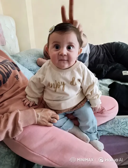 Baby's Playful Kung Fu Dance on Adult's Lap – AI Generated Video | Hailuo AI