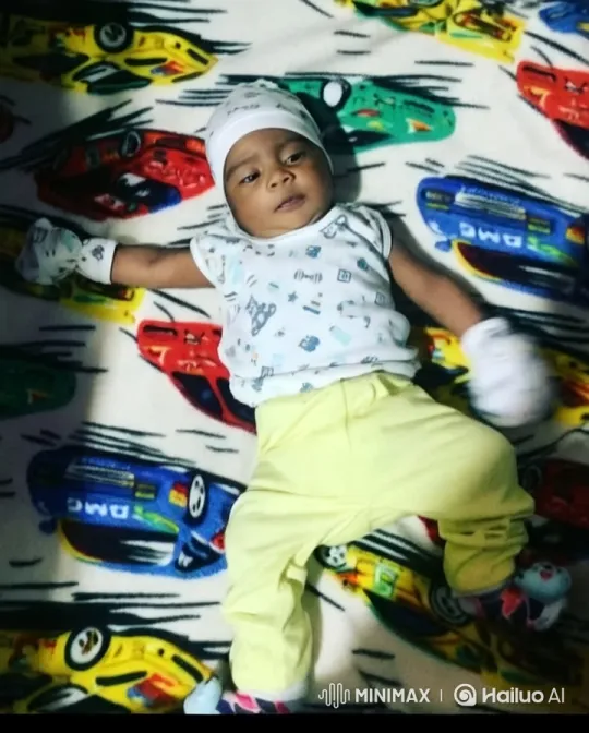 Baby's Playful Kung Fu Dance on Colorful Blanket – AI Generated Video | Hailuo AI