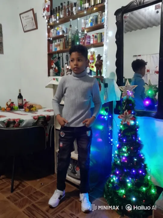 Boy Dances Energetically in Festive Christmas Setting – AI Generated Video | Hailuo AI