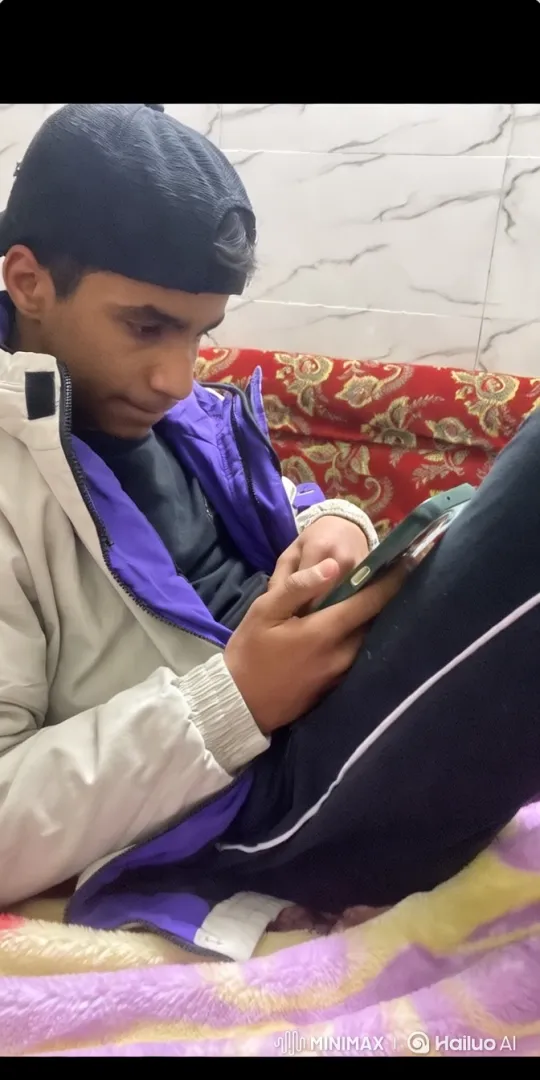 Young Man Relaxing on Couch, Smoking – AI Generated Video | Hailuo AI