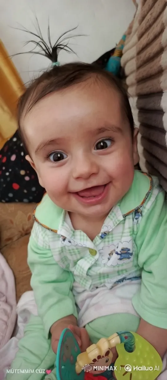 Baby Dancing Playfully on Couch with Toy – AI Generated Video | Hailuo AI